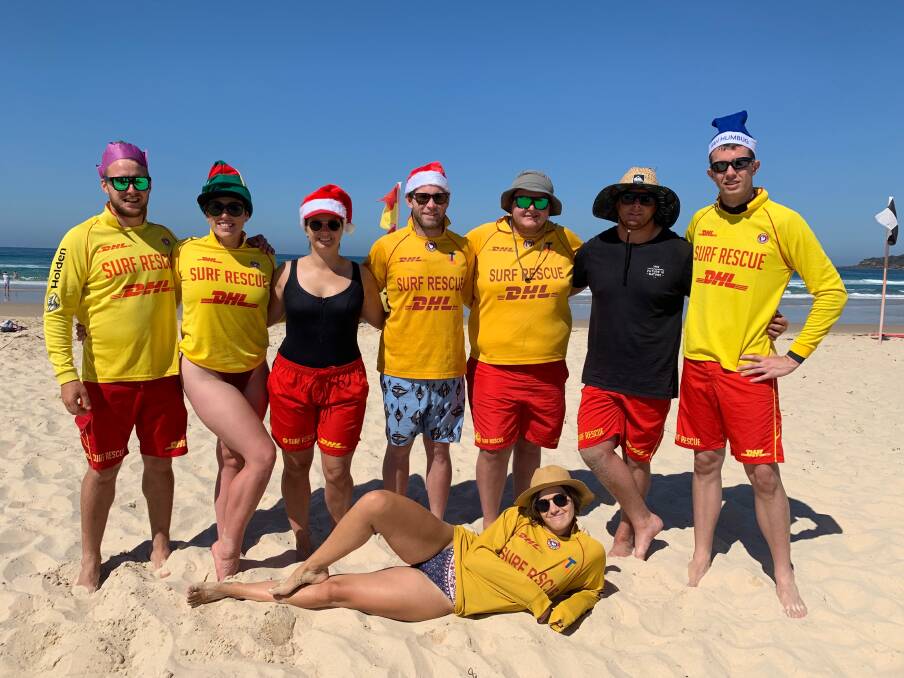 Pambula SLSC members in the festive spirit as they complete their Christmas day shift, on New Year's Day the patrol tended to four stingray injuries at the Rivermouth.