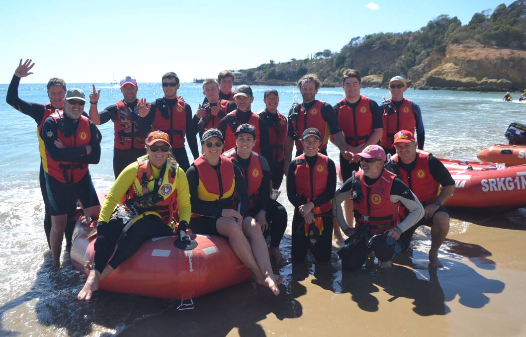 Drivers and crew members stop for a quick break before undergoing a search and rescue scenario at Tathra on Sunday. 