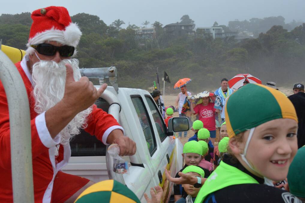 Ho Ho Holty: Twilight nippers at Pambula Surf Life Saving Club was cut short due to a storm on Saturday, although "Santa" still made an appearance. 