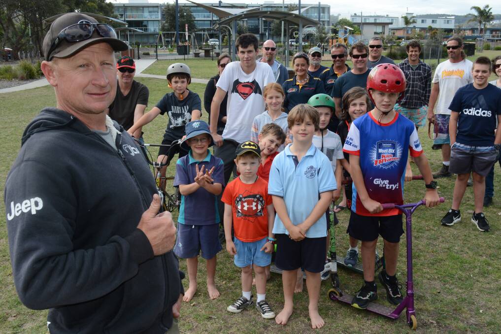 Peter O'Keefe at Ford Park with local kids hoping for a new skate park.