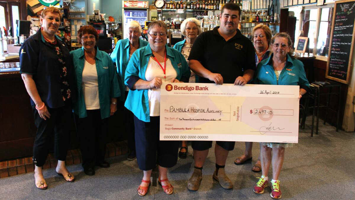 Pambula Hospital Auxiliary receive a check from The Royal Willows Hotel.