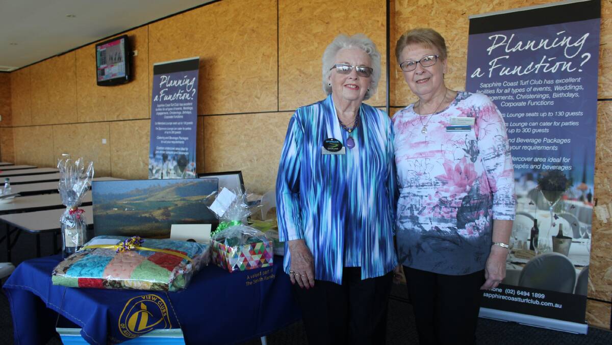 Fundraiser: Vice president of the Merimbula Day View Club Helen Cook and president Danielle Watkins selling raffle tickets at the Sapphire Coast Turf Club. 