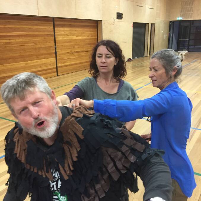David Grainger being measured up by costume designer and director Victoria Cordova and costume manager Sue Jennings.
