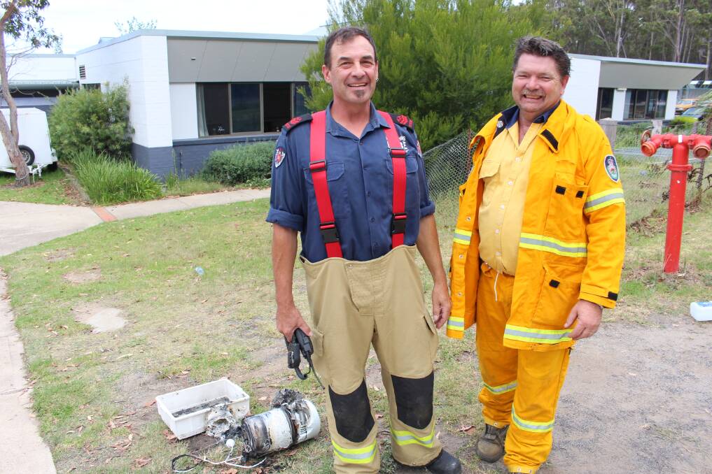A-Team: Jason Moore of NSW Fire and Rescue monitors the melted mess, pleased with Pete Reynolds and Pambula Rural Fire Brigade's quick response. 