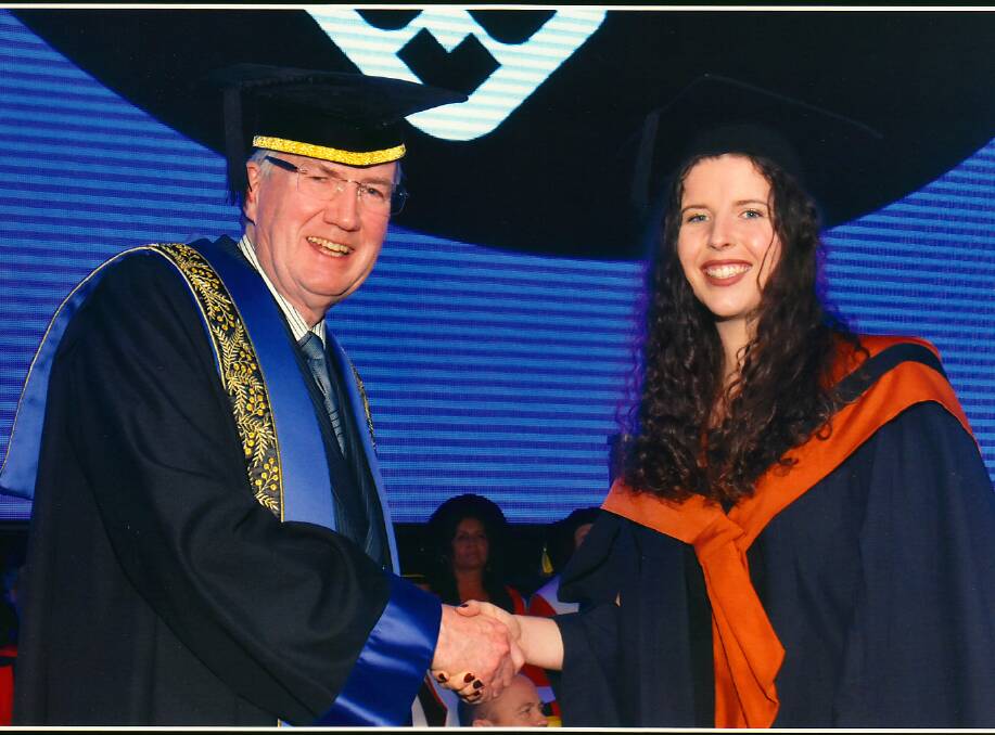 Glad grad: A former resident of Mirador, Danielle Hynes happily shakes the hand of the pro vice chancellor at her graduation ceremony on May 1.