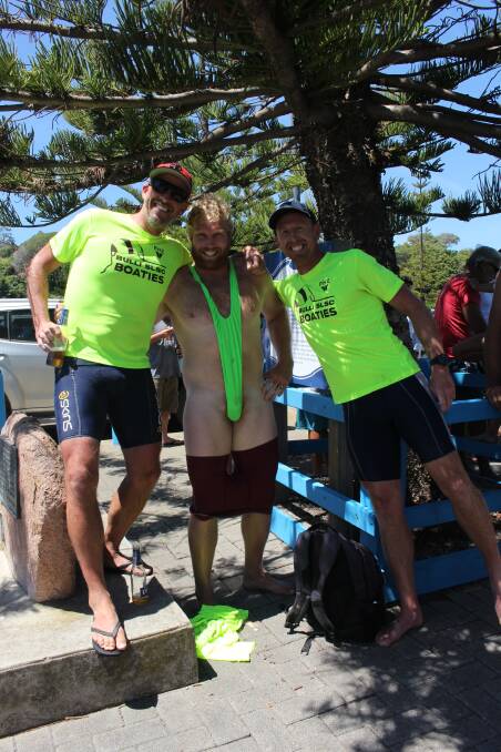 All for laughs: Mitchell 'Borat' Roberts with Bulli Open Men's crew members who were shocked he wasn't 'split in half' after rowing in his costume.