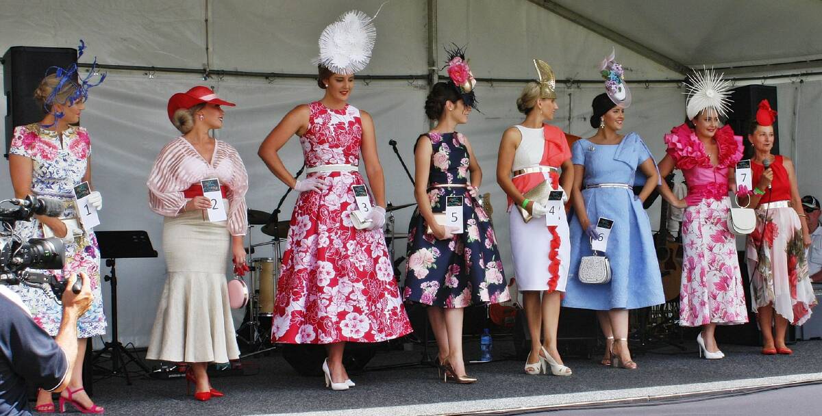 Wearable art: Seven ladies each represented their district turf club at the SERA Fashions on the Field final in Goulburn. Photo: Alicia Ambrose.