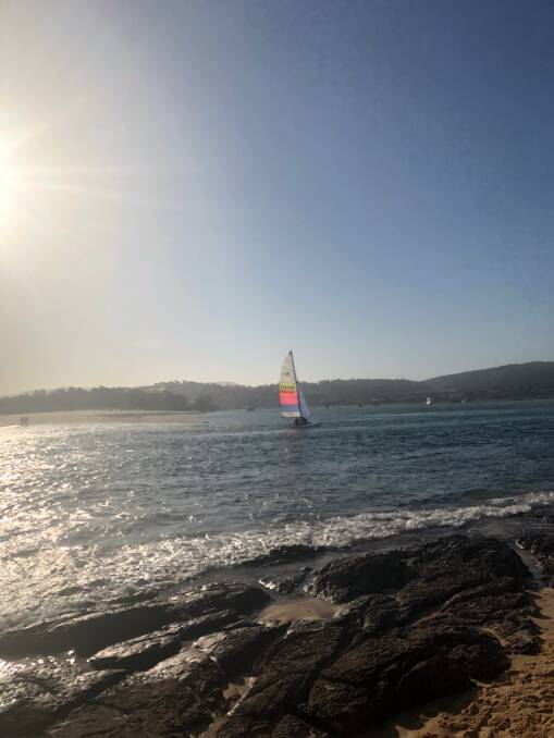 A Catamaran returning into Merimbula lake after a fun session whizzing about in the northerly wind on Monday, January 30.