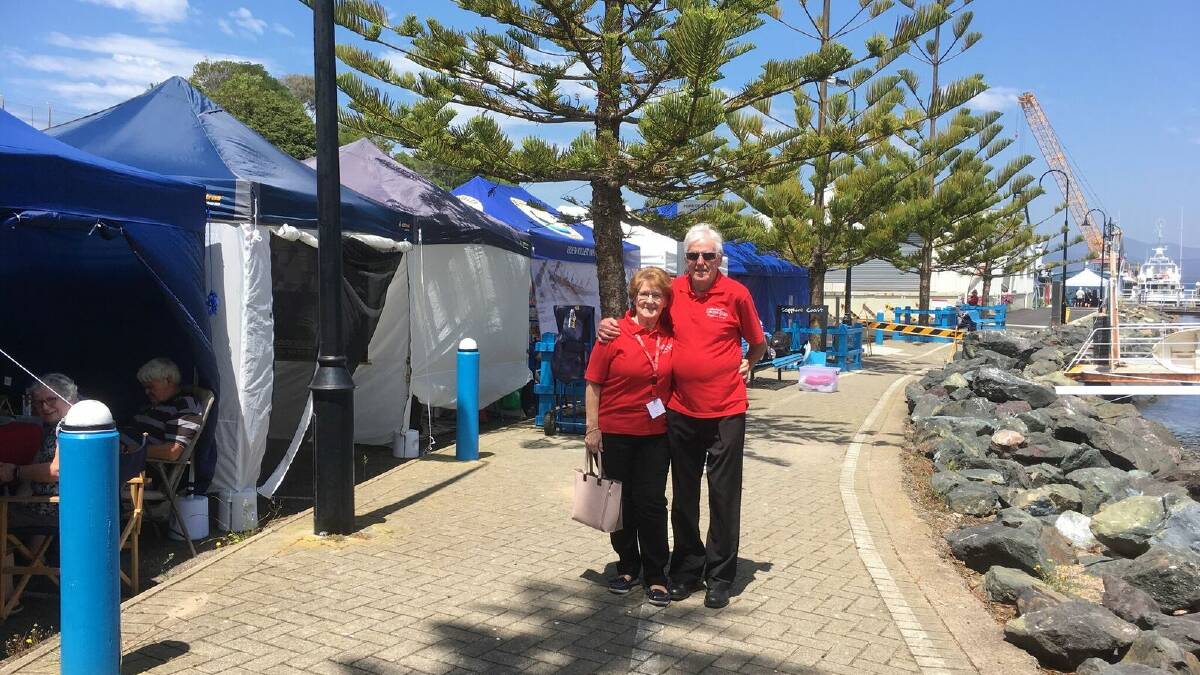 Barb and Bob Westmacott prepare to welcome cruise passengers at the wharf in Eden.