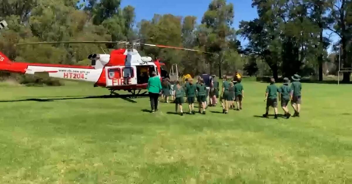 FLOWN IN: Teachers from Bedgerabong Public School, west of Forbes NSW were flown in over floodwaters to attend class on Monday. Picture: supplied