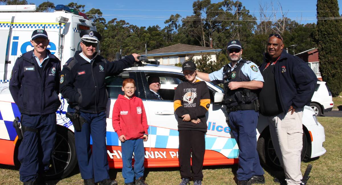 Local police attend the NAIDOC Week community celebrations at Eden's Endeavour Park on Thursday.