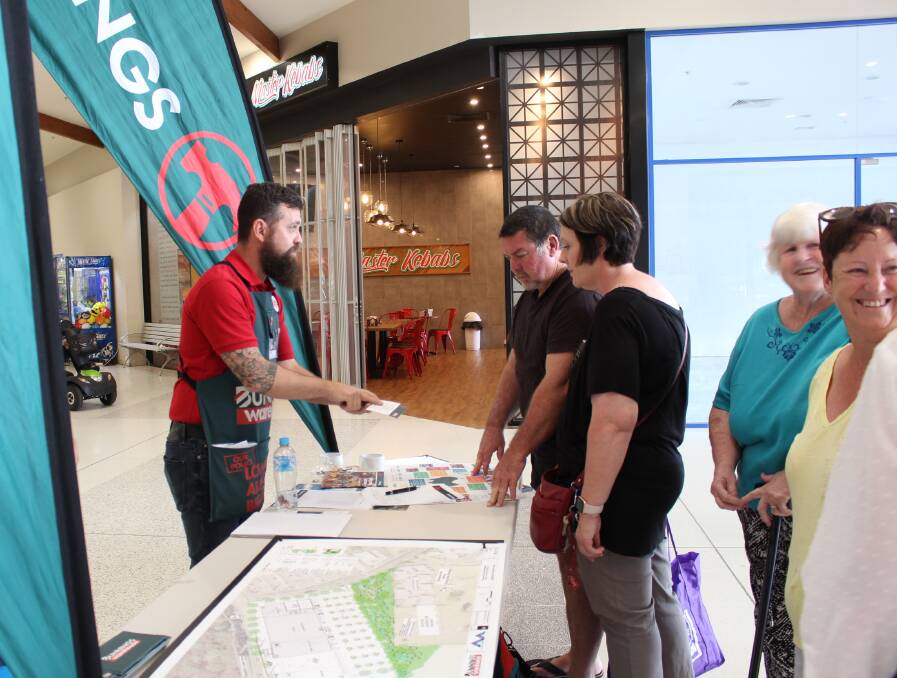 A steady stream of people visited the Bunnings booth at Tura Beach.