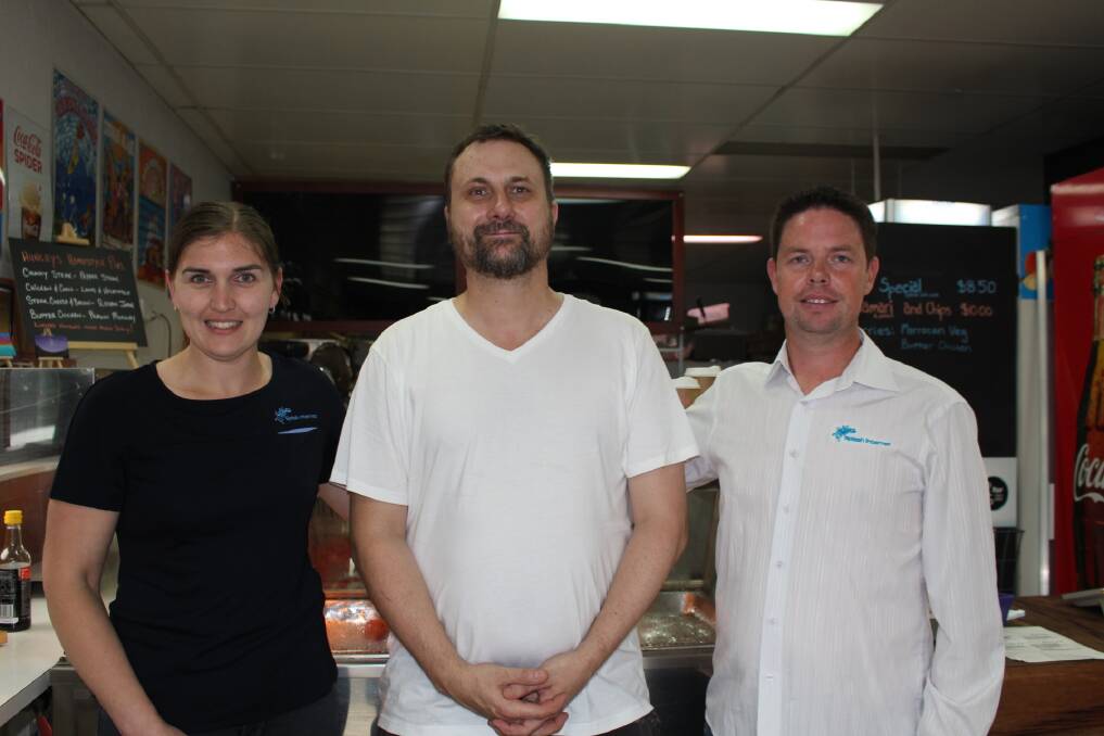 Lisa and Paul McCooey who own Splash Internet with owner of Hungry's, Merimbula Jason Holley, centre. 