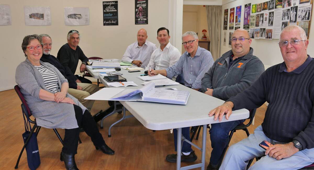 Lis Shelley and Chris Ball (Twyford Hall Inc), Michael Marshman (Michael Marshman Architects), Adre de Waal and Michael Chant (Donald Cants Watts Corke), Charles Cooper, Lucas Scarpin and Bill Deveril (Twyford Hall Inc) discussing plans for the new Theatre Twyford. 