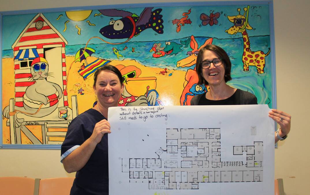 PLANS FOR IMPROVEMENT: Nurse Tracey Keeley and nurse manager Kelly Jurd hold the plans for the refurbishment of Pambula Hospital.   