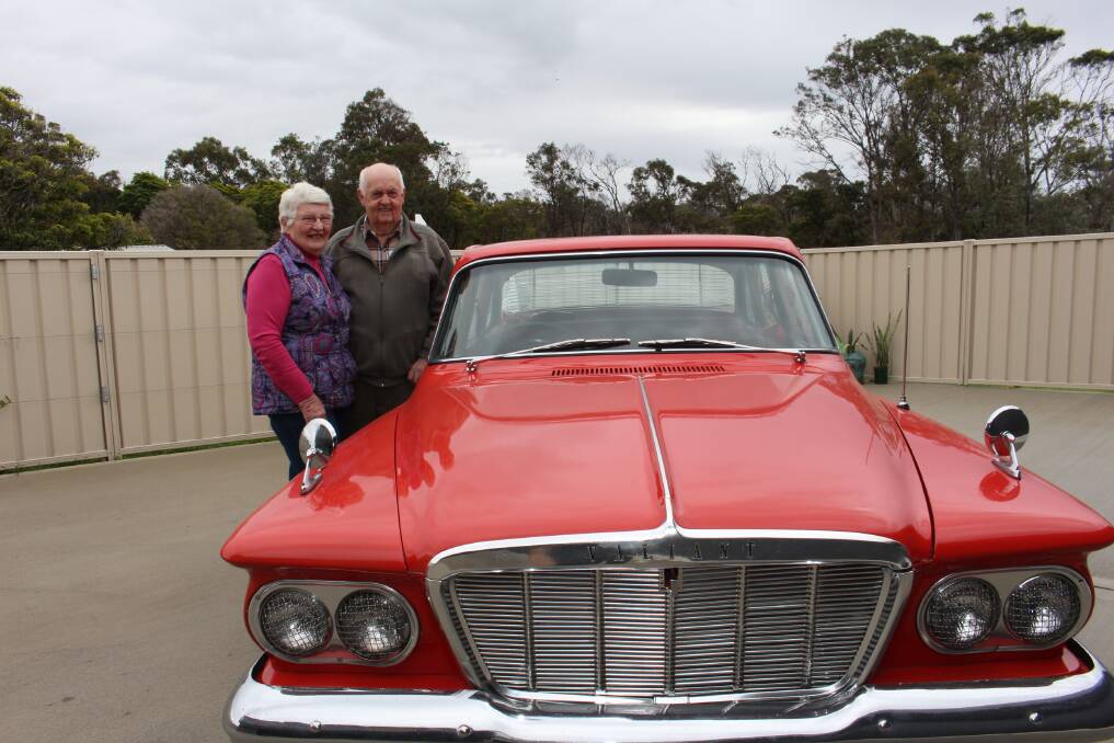 Car club members Ailsa and Max Sinclair with their 1962 S Model Valiant.