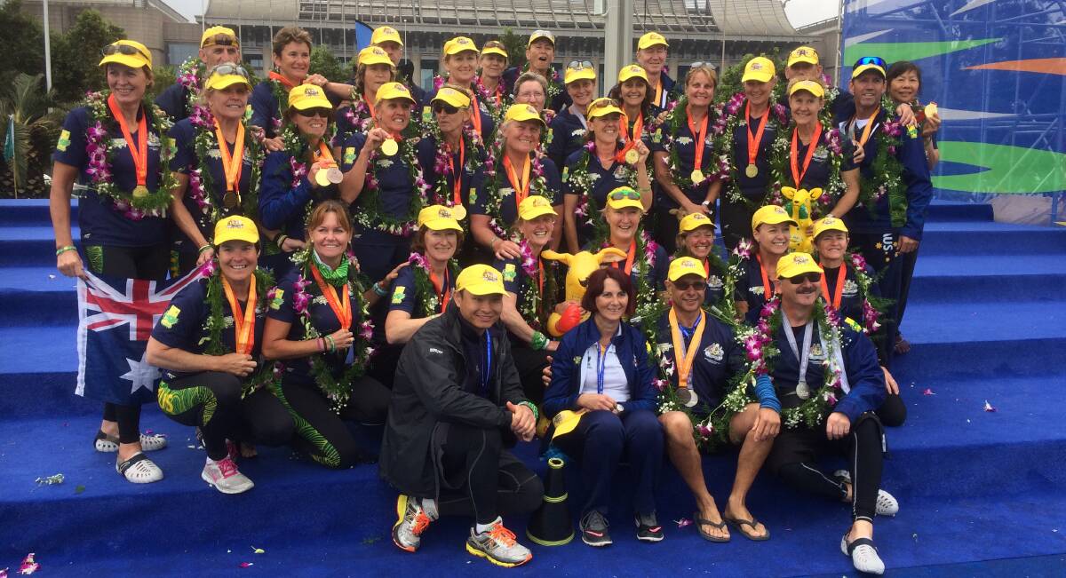 WINNING COMBINATION: Coach Chris Cheung, front left, with some of the Australian dragon boat team members in China.