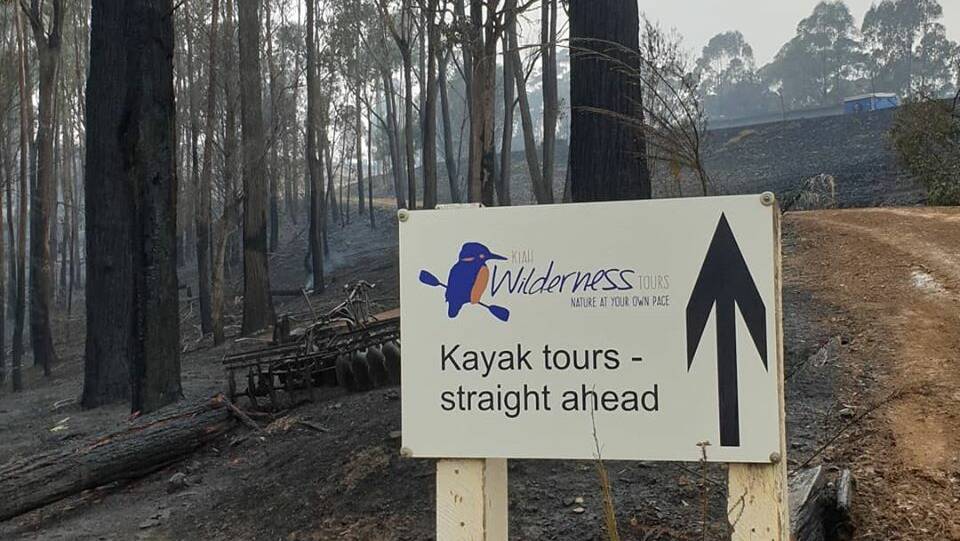 Bushfire backdrop at the Robbs Kiah property.