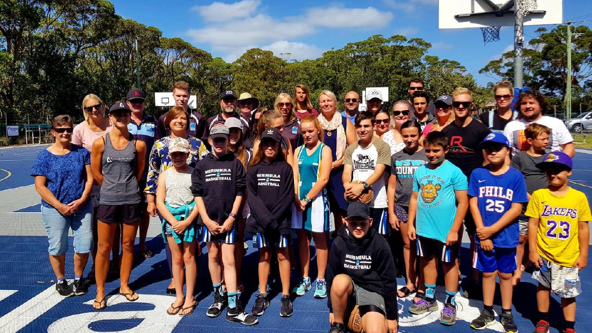 Labor candidate Leanne Atkinson and Shadow Minister for Sport Lynda Voltz on Sunday, February 24 with basketball and netball players.