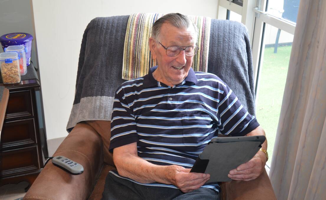 95-year-old Reginald Warn uses an iPad to connect and keep in touch.