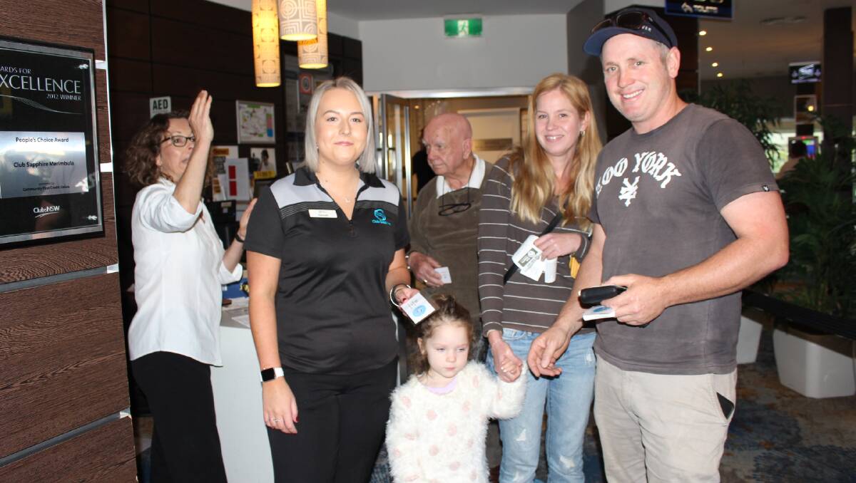 Club Sapphire staff member Hannah Klobasa with Kalaru family Jason Hoyland, Melanie Nast and daughter Alice Hoyland.
