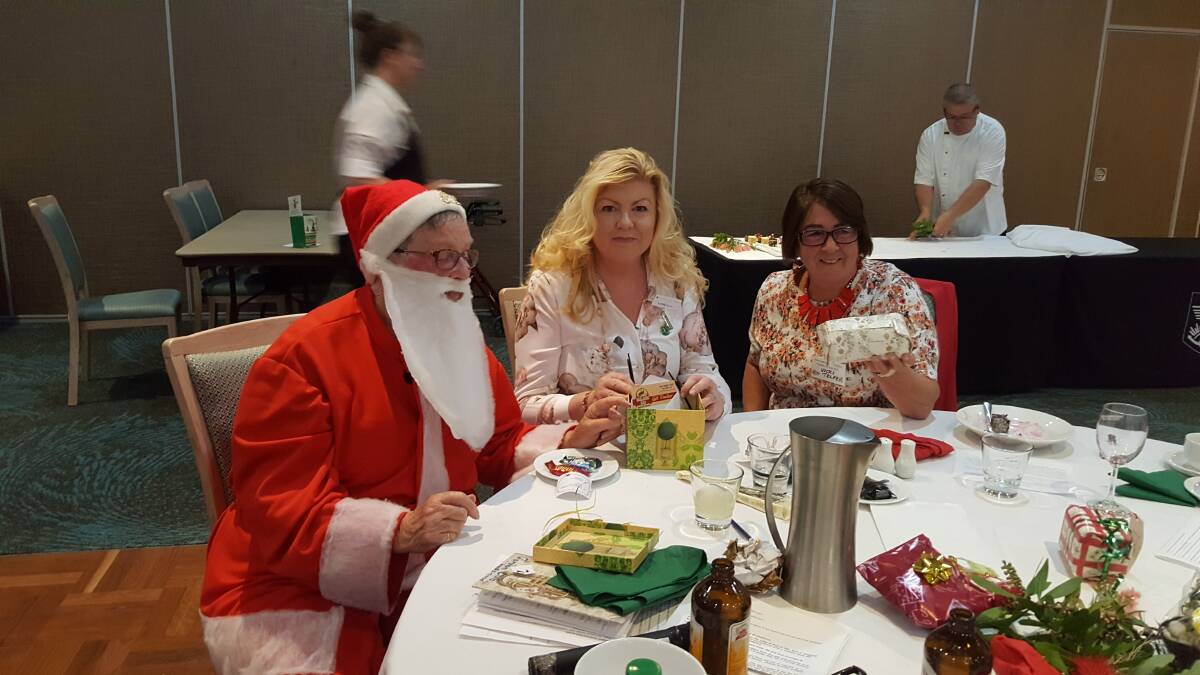 Mrs Merry Santa Clause with Lindy Bolser from Ulladulla Garden Club member Vicki Telfer from Eden.