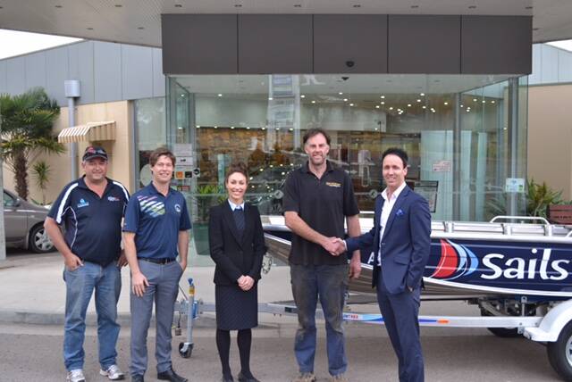 Heath Marshall is the ecstatic winner of a boat and trailer package worth $10,000 put together by Pambula Merimbula Golf Club with Sails Real Estate and Fraser Marine.