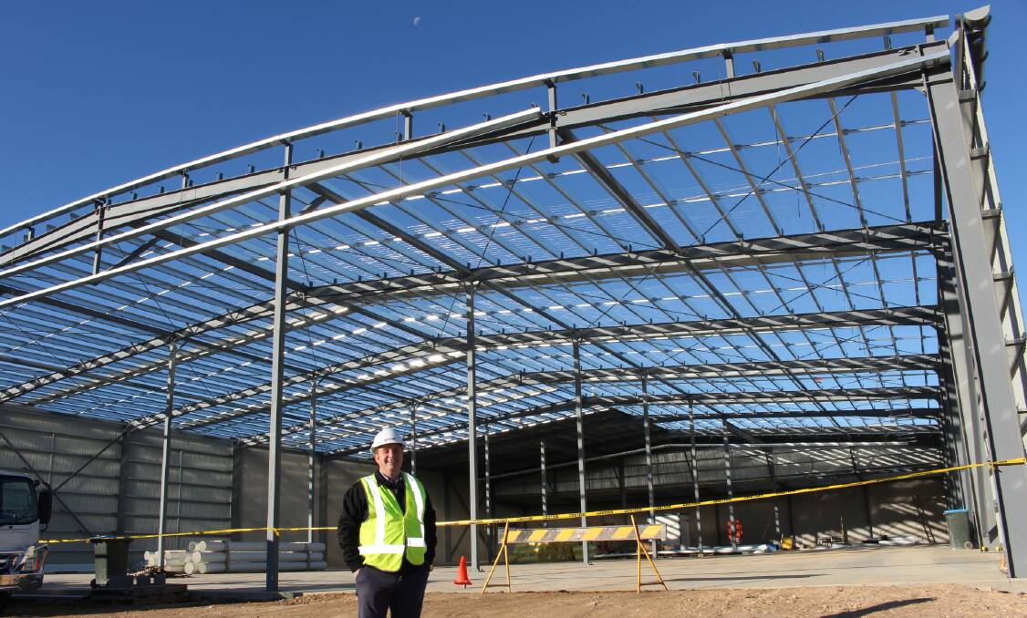 General manager of the Sapphire Coast Mitre 10 store, Chris Flint outside the new extension. 