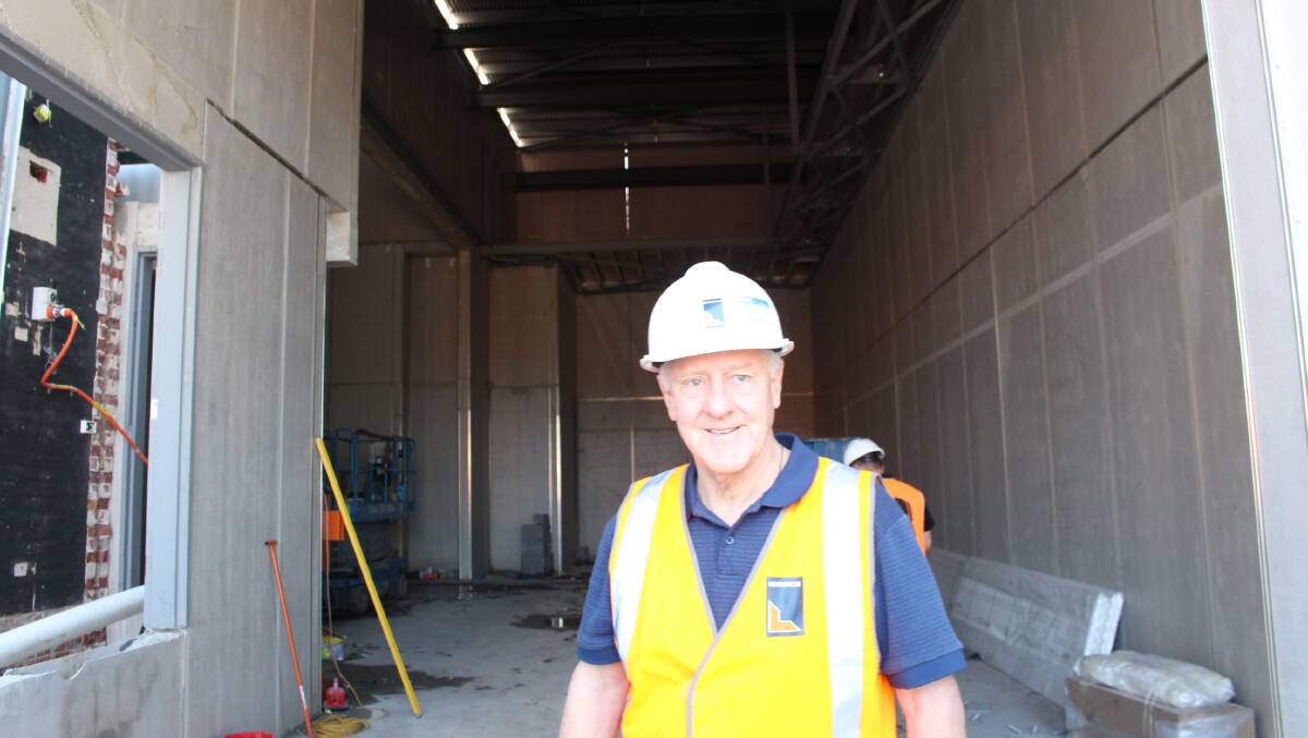 Building project manager Charles Cooper, at what will be the loading dock for the new theatre.