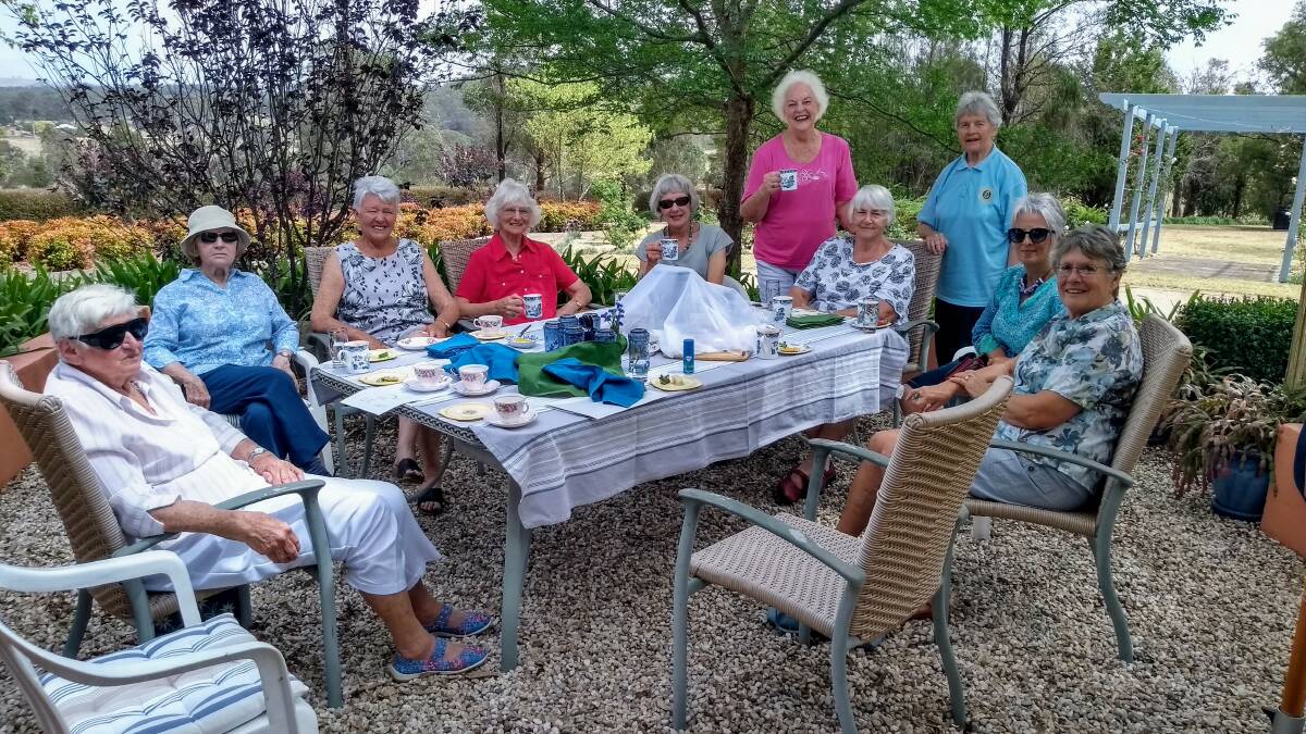 CWA members relax at a Friday coffee morning at the home of one of their members.