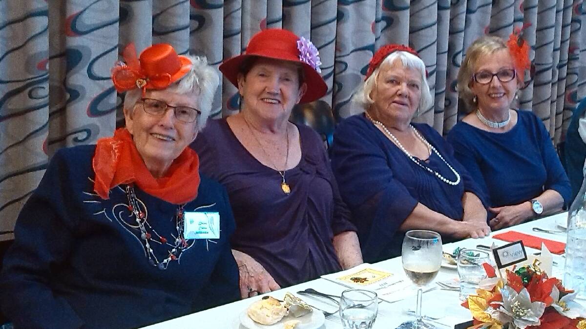Red Hat ladies join Merimbula Evening VIEW Club’s end of year dinner.
Elaine Johnston, Beth Anderson, Thelma Regan and Cheryl Armstrong. 

