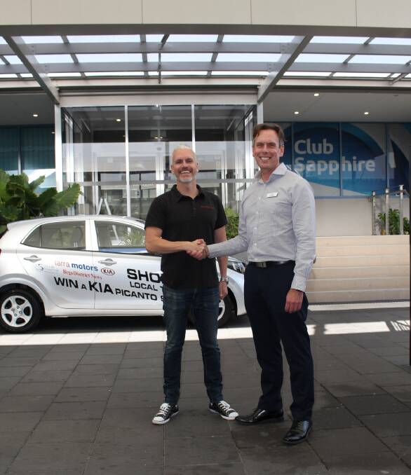 ACM sales manager for the Far South Coast Tim Shinnick and CEO of Club Sapphire Damien Foley with the car which is parked at the club for the duration of the promotion.