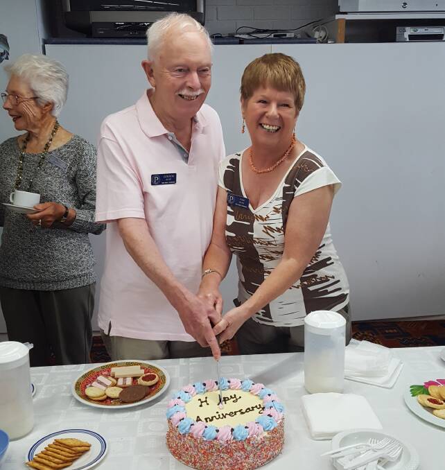 Pam and Gordon Hunt cut the 23rd anniversary cake at Probus.
