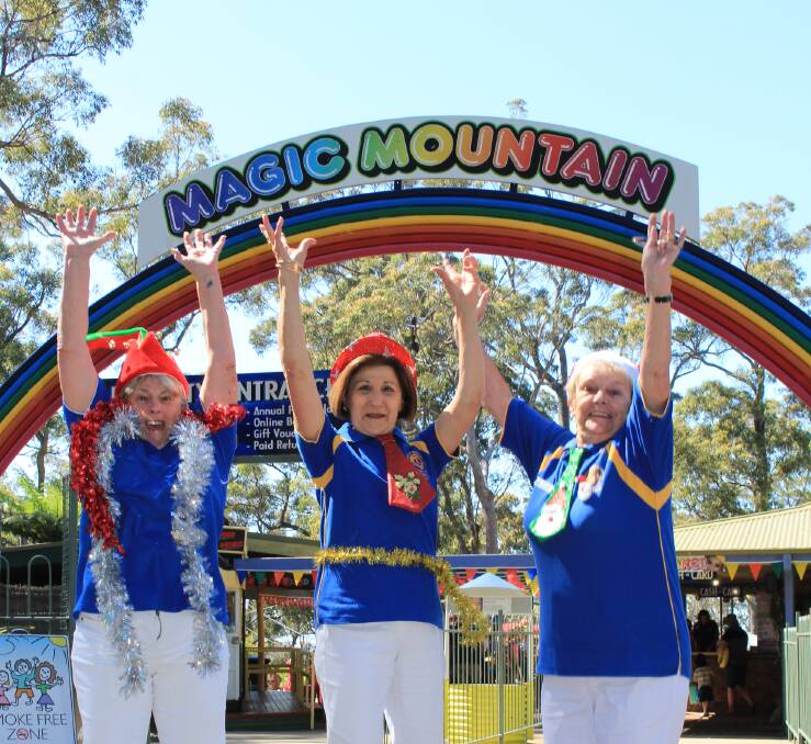 Carols on the Mountain: Merimbula Pambula Lions Club members can't hide their excitement at the upcoming Carols by Candlelight at Magic Mountain. 