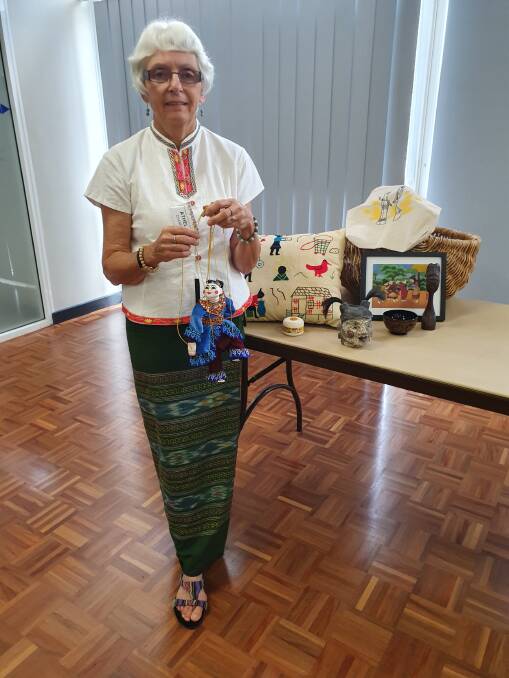 Athelia Channon modelled a traditional garment worn by the women of Myanmar at the Garden Club meeting. 