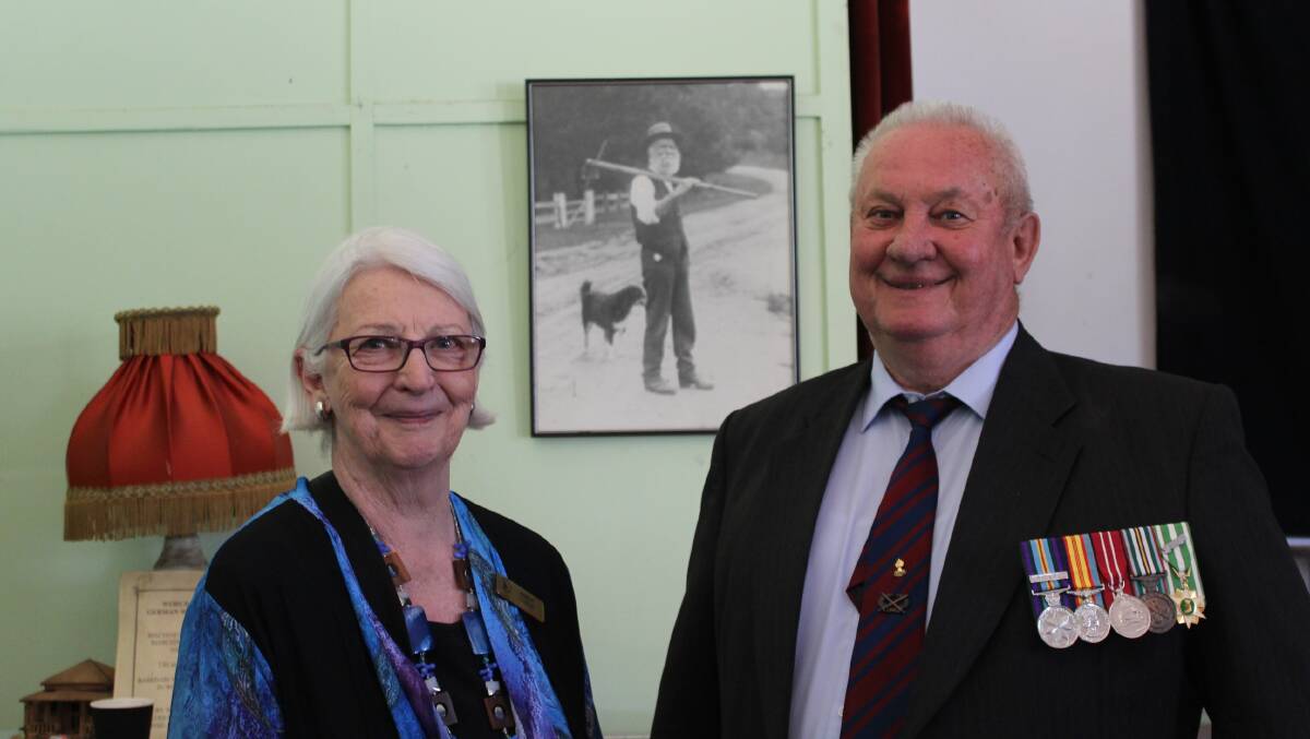 Brother and sister: Margo Lester, sister of Bruce Bofinger with a photo of their great grandfather John Doyle.