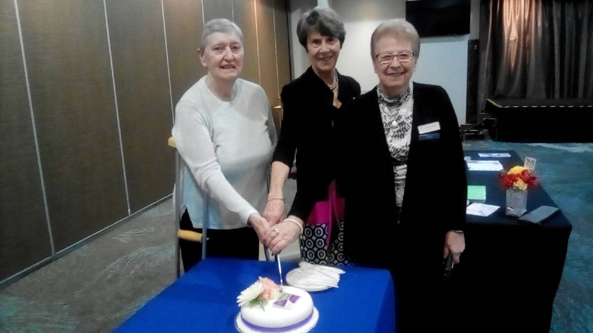 Zone councillor Valerie Hobbs, national vice president Pat McRae and club president Danielle Watkins cutting the cake at the recent 22nd VIEW Club birthday celebrations. 