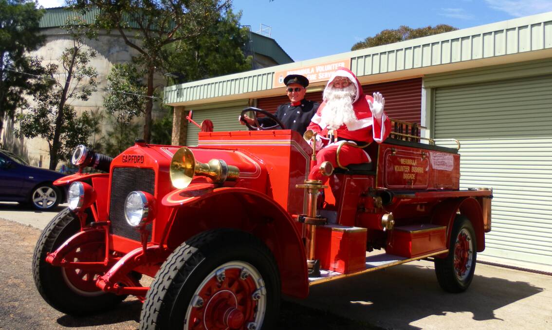 Col Hazell and Santa will be heading towards Pambula on the vintage fire truck.