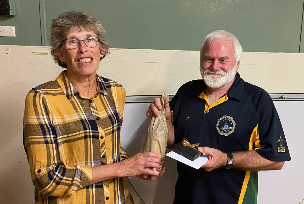 Ann Jones thanks Jim Clark for his many years at the helm of the 1st Merimbula Scouts and Venturers as group leader.