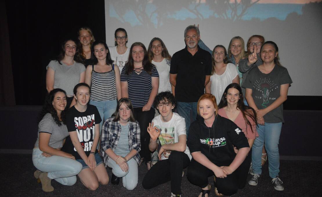 Lens reversed: Teacher, Peter Staubli with some of his young film making students, following the screening of their films at The Picture Show Man Cinema, Merimbula.