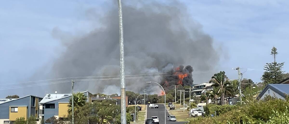 Emergency services rush to Eden's Aslings Beach on Tuesday, September 19 after a fire started and warning level had been increased to catastrophic. Picture by James Parker