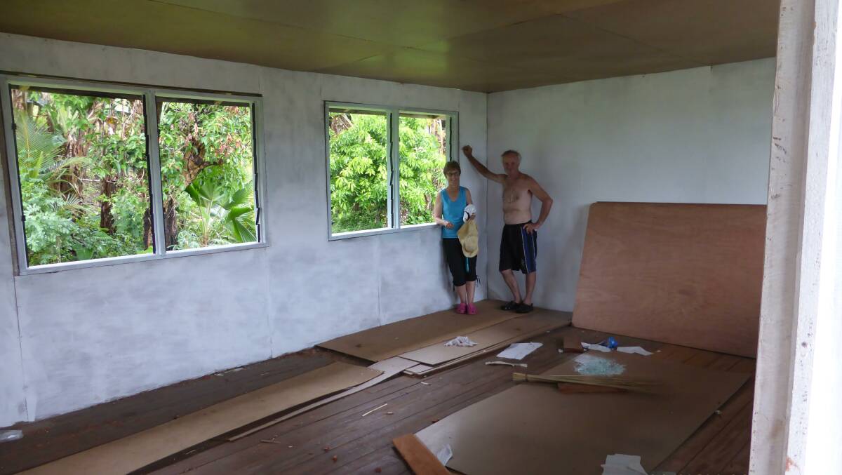 Wolumla couple Ann and Ross Cooper during building of the top floor of the new school.