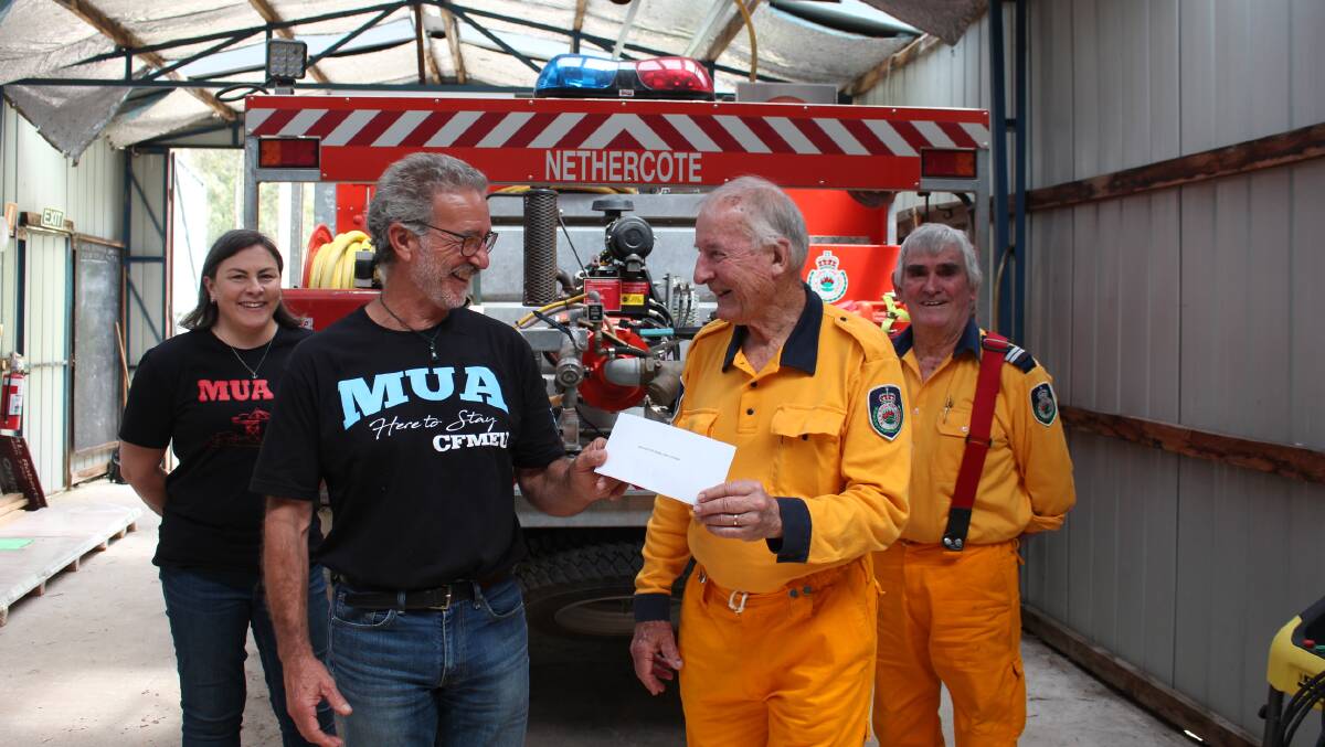 SMILES ALL ROUND: Nethercote Maritime Union of Australia member Brian Ahern hands the $5000 cheque from the MUA to Nethercote RFS treasurer Mike Lackey watched by MUA national officer Mich-Elle Myers and Nethercote RFS deputy captain Ray Robinson.