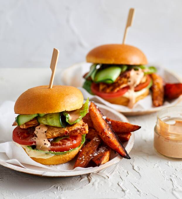 Sweet chilli chicken burgers with sweet potato wedges. Picture: Bonnie Coumbe
