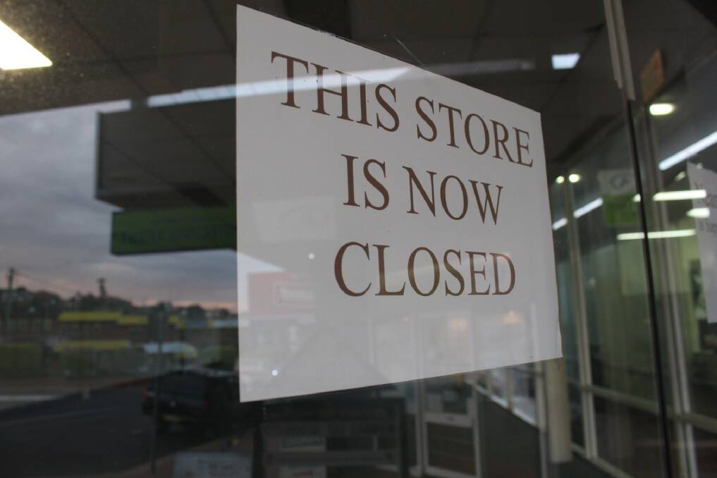 Just one of the empty shopfronts on Merimbula's Market St. Businesses are feeling the sting of a changing world. 