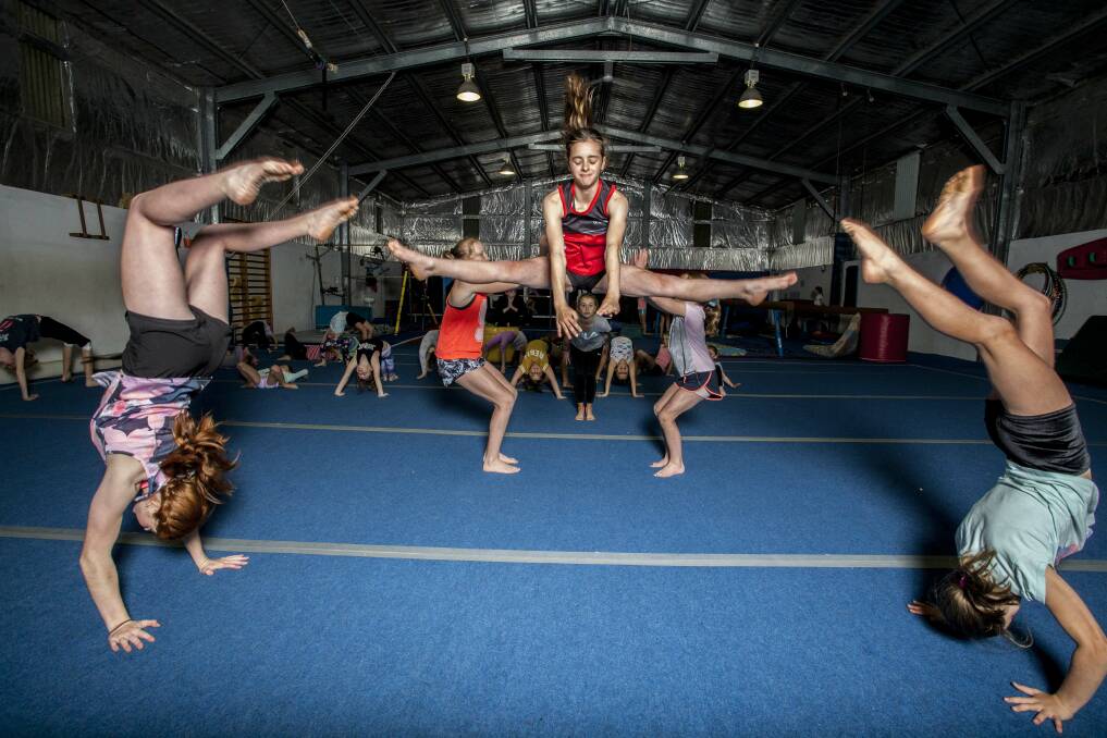 High achievers: Pippa Sporljaric and the development squad show off their skills at the Eden Area Gymnastics centre in Pambula last week. Photo: Rachel Mounsey