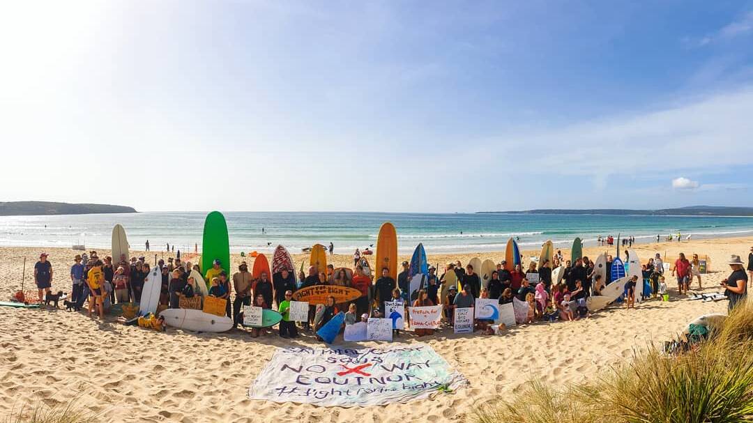 A crowd of more than 200 gathered at Merimbula's Main Beach in protest against plans for oil to be drilled from the Great Australian Bight Photo: ShanaYoung