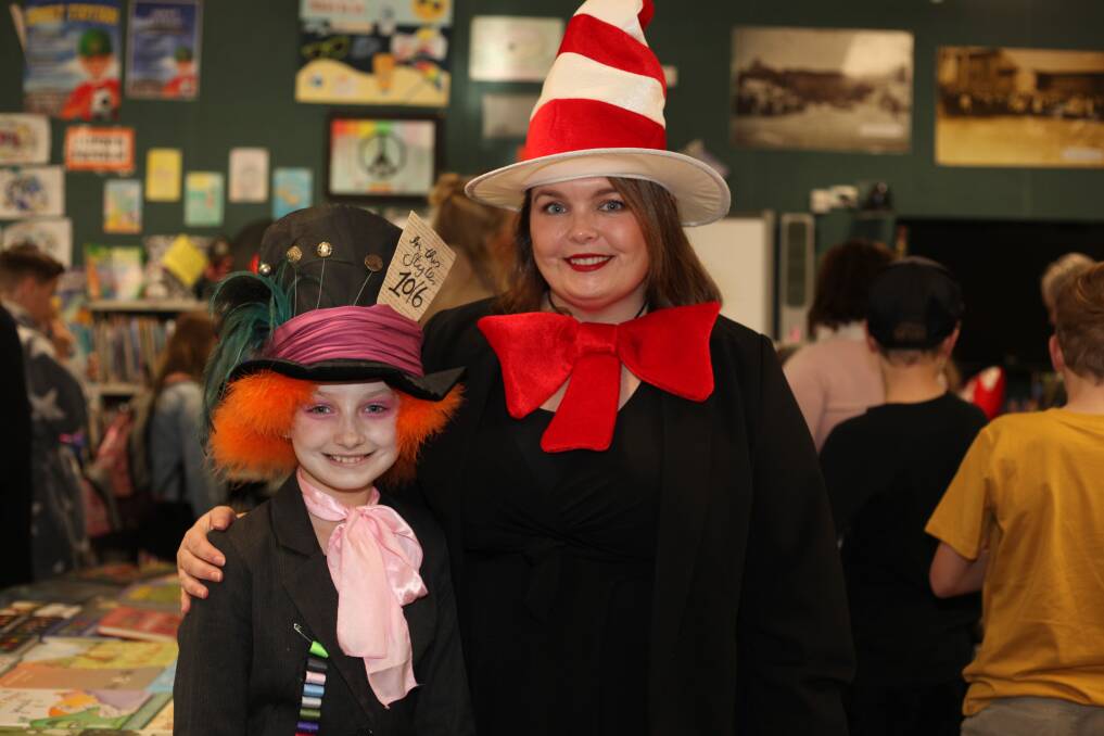 Hats off : The Mad Hatter Evie and The Cat in the Hat Pambula Public School principal Ms Leah Martin. Photo: Rachel Mounsey