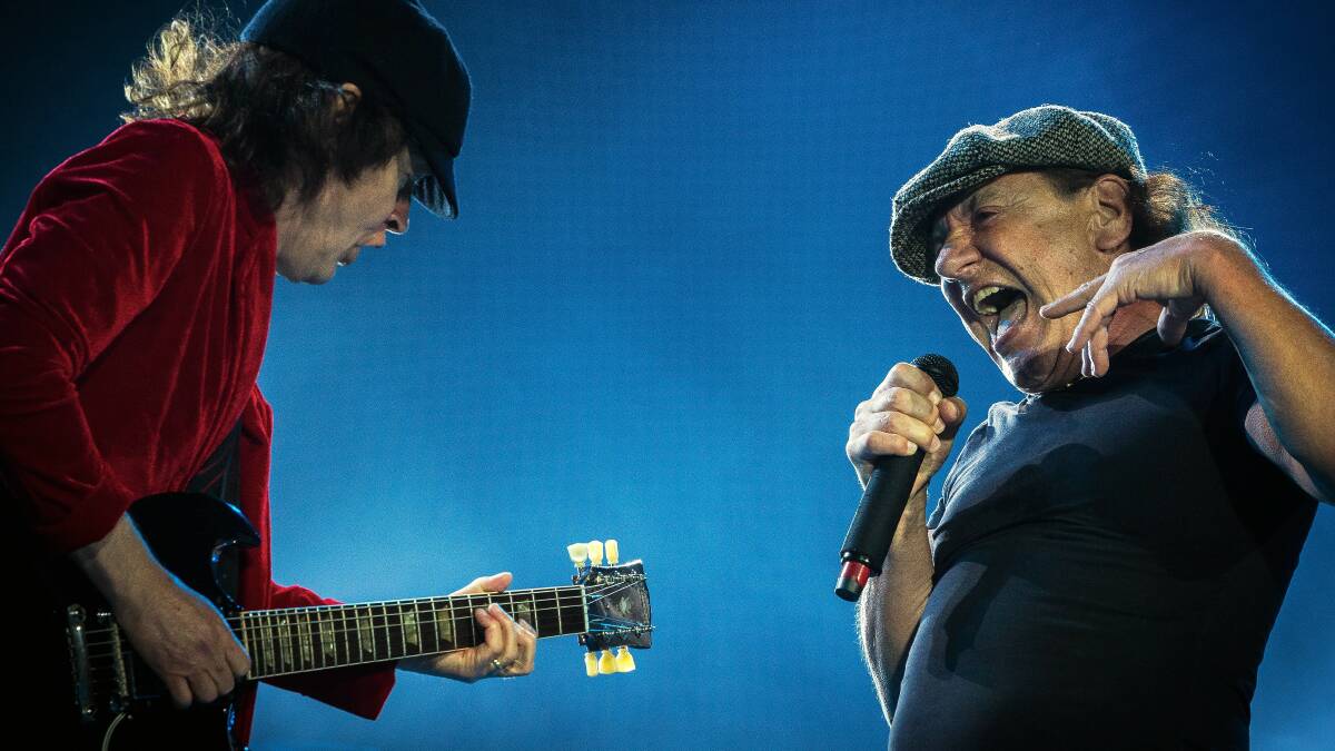 Guitarist Angus Young and Singer Brian Johnson of AC/DC perform on stage during the legendary Australian rock band's Rock or Bust World Tour in 2015 in Melbourne. Picture: Chris Hopkins