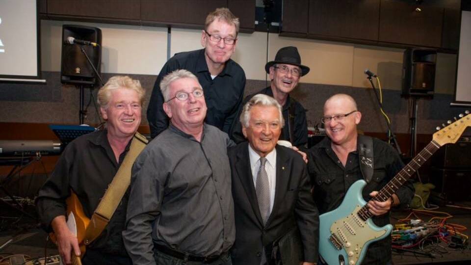 Peter Logue (second left) reunites with Bob Hawke and friends in more recent years. 